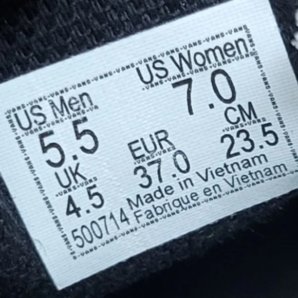 Vans Black and White Slip-On Sneakers - Picture 5 of 10